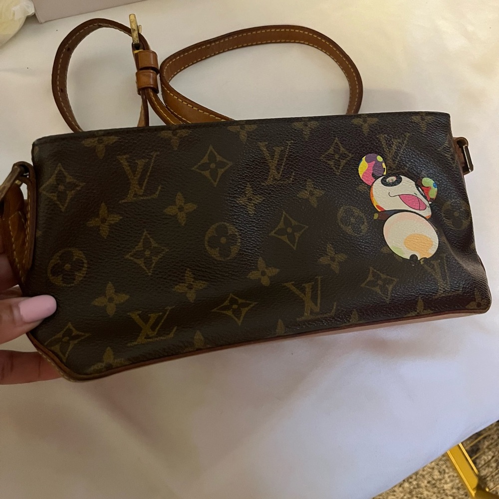 LOUIS VUITTON
Takashi Murakami X Louis Vuitton Monogram Canvas Panda Trotteur